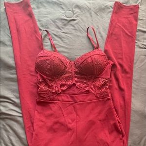 Burgundy jumpsuit with lace.